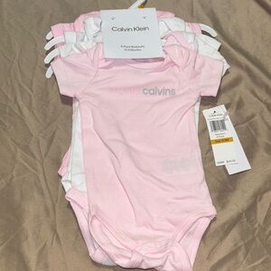 Calvin Klein Baby Bodysuits - Pink and White